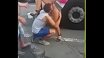 A Man Gives Oral Sex In A Public Place To A Woman