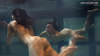 Lesbian Girls In Pool Indulge In Sensual Breast Caresses Underwater