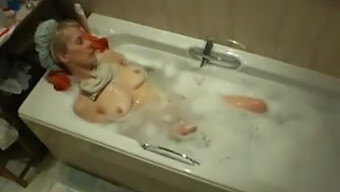 Hazel May's solo bath time pleasure